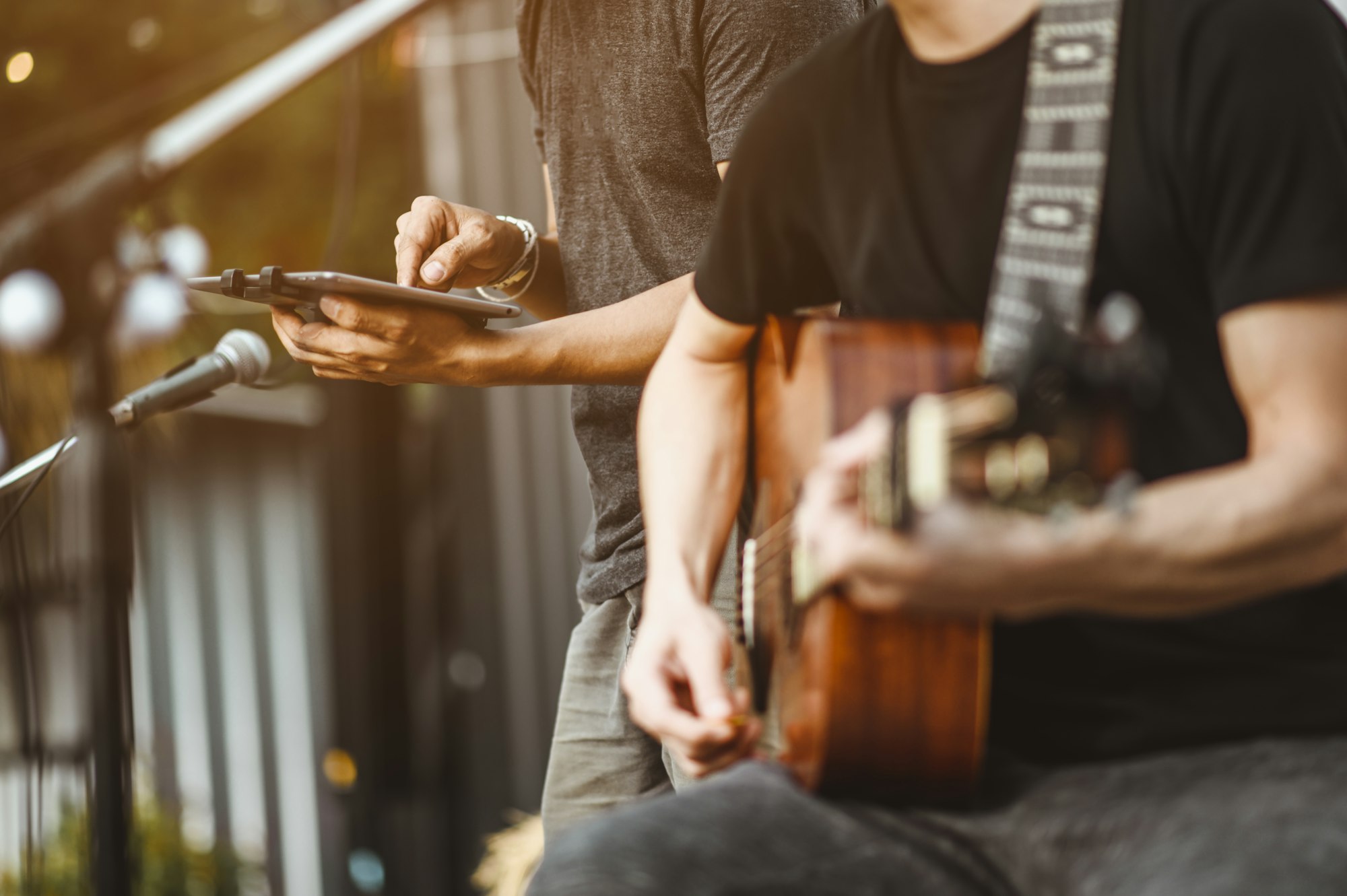 Close-up of musicians, guitarists playing blues. Singers are checking their voices