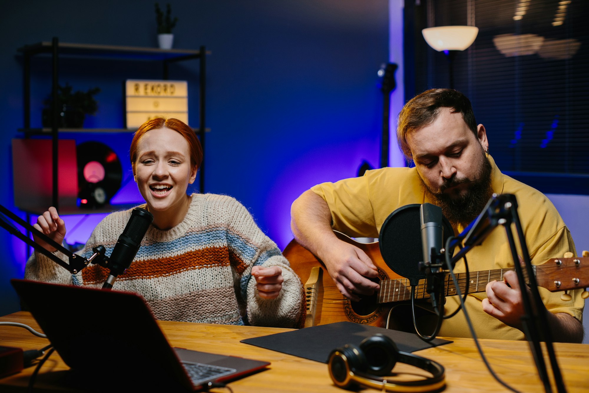 The presenter and the guest perform the song during the radio broadcast.